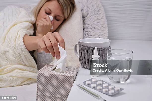 Woman Caught Cold Flu Running Nose Healthcare And Medical Concept Stock Photo - Download Image Now