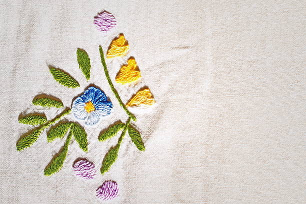istock Blue flower embroidery on canvas 635785602