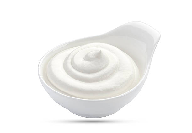 istock Sour cream in bowl isolated on white background 635788522