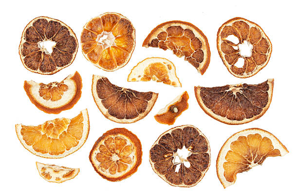 istock Dried oranges slices isolated on white background 635788658