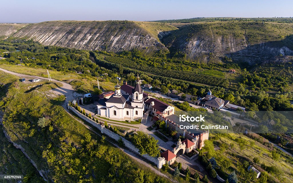 Sunset in Orhei, Republic of Moldova, Aerial view with the Sunset in Orhei, Republic of Moldova, Aerial view with the old Church at The Old Orhei Architecture Stock Photo