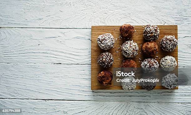 Healthy Raw Energy Balls On A White Wooden Background Stock Photo - Download Image Now