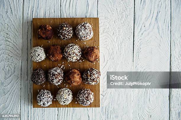 Healthy Raw Energy Balls On A White Wooden Background Stock Photo - Download Image Now