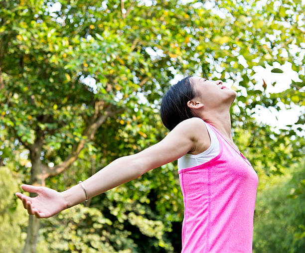 istock Young woman enjoying nature 635795160