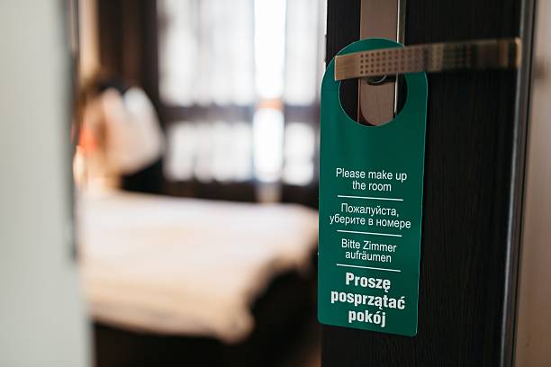 istock Door hanger please make up my room in 4 languages. 635799578