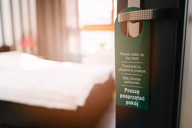 istock Door hanger please make up my room in 4 languages 635799664
