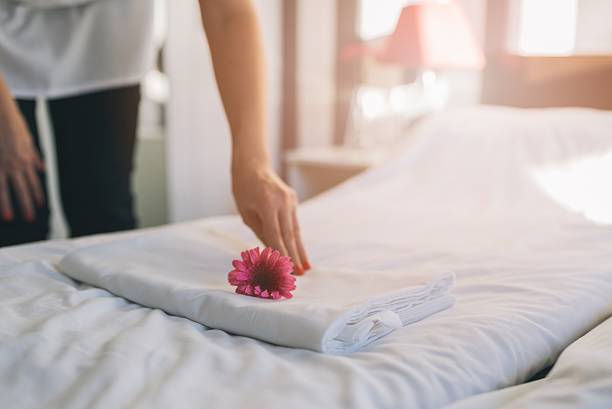 istock Hotel maid doing room service. 635799938