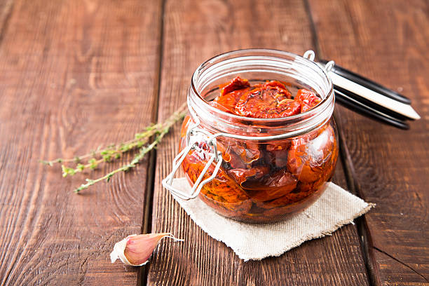 istock Sun dried tomatoes with herbs and sea salt 635800540