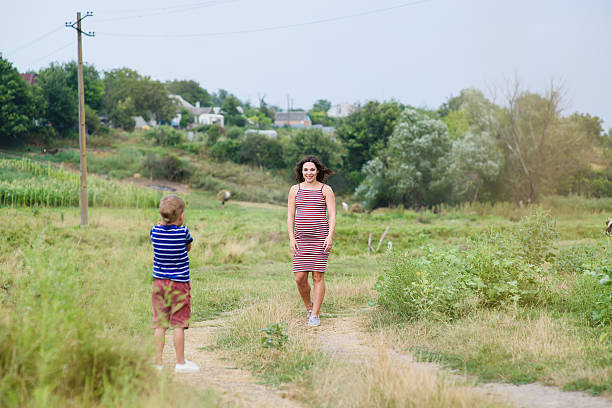 istock Pregnant woman with her son 635800600