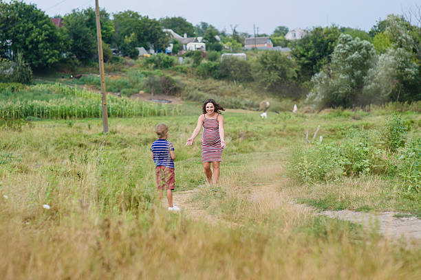 istock Pregnant woman with her son 635800714