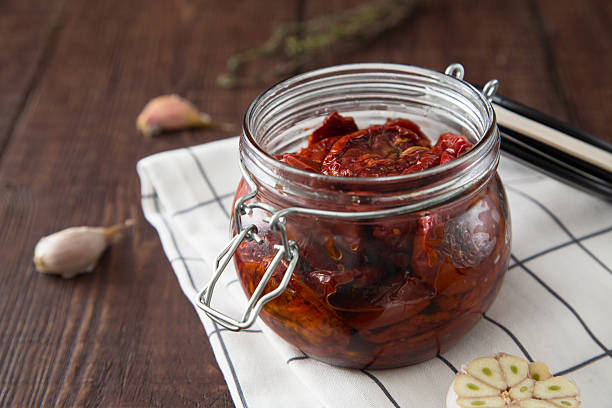 istock Sun dried tomatoes with herbs and sea salt 635800734