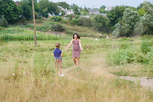 istock Pregnant woman with her son 635800810