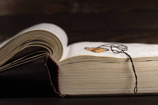 istock The old open book - the Holy Bible 635805742
