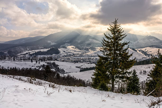 istock stormy weather over rural area in mountains 635808372