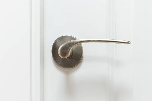 istock metal door handle isolated on white door 635812388