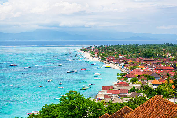 istock Tropical beach, town and ocean in Bali 635812430