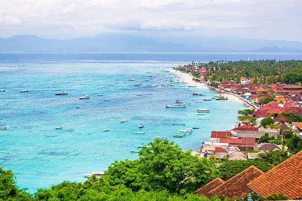 istock Tropical beach, town and ocean in Bali 635812510