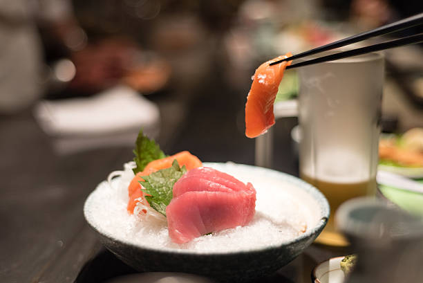 istock Tuna and salmon sashimi in bowl 635812774