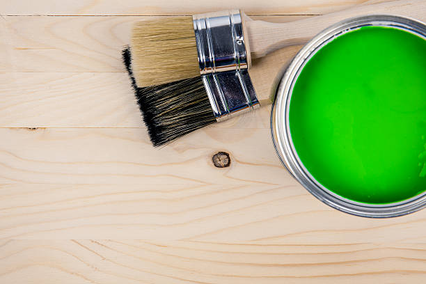 istock Paint bucket on a wooden background 635815156