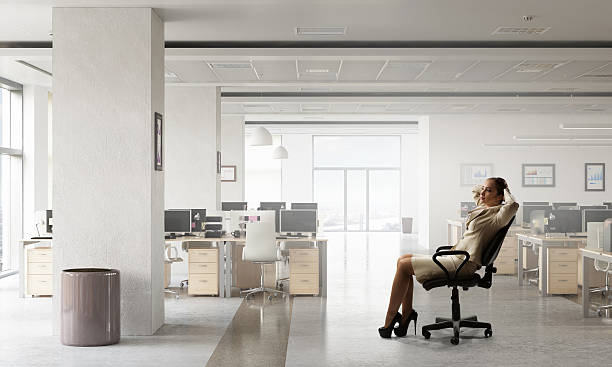 istock Lady boss in office chair . Mixed media 635815204