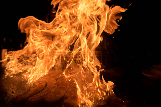 istock Chef flambing bananas 635815836