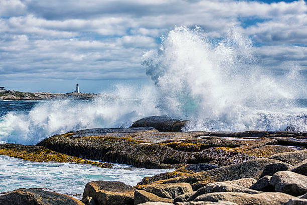 istock Breaking Windblown Surf Waves Crashing Peggy's Cove Canada Coastline Rocks 635817688