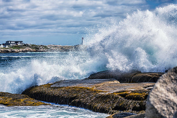 istock Massive Breaking Surf Waves Crashing Peggy's Cove Canada Coastline Rocks 635817730
