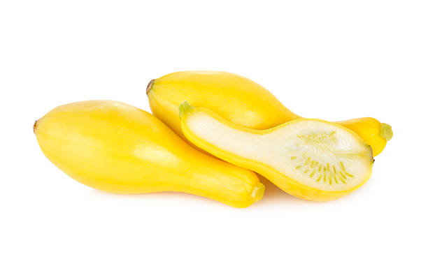 istock whole and half cut fresh squash crookneck on white background 635818272