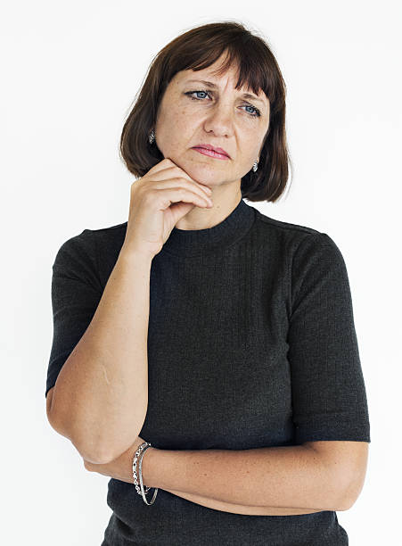 istock Woman Serious Studio Portrait Concept 635820616
