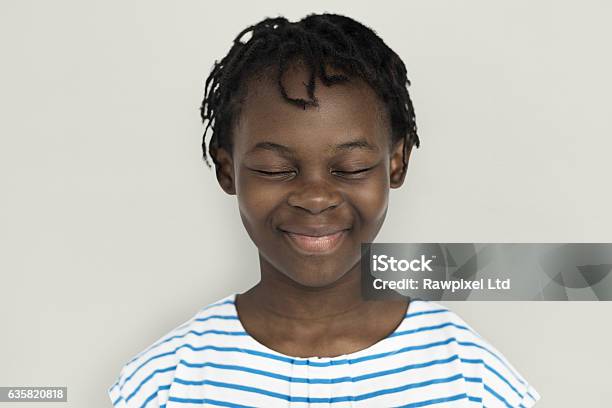 Cheerful Girl Standing Smiling Concept Stock Photo - Download Image Now - Eyes Closed, Child, Adult