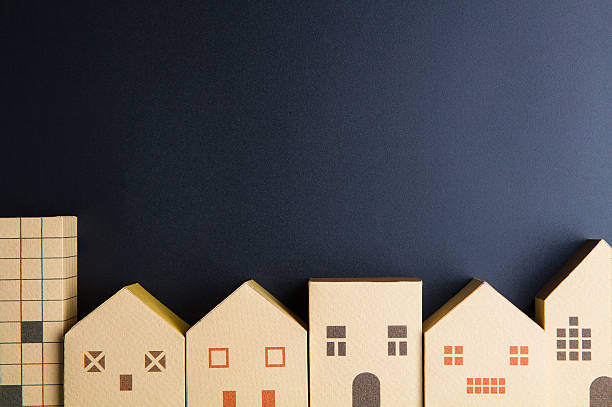 istock Home architectural model paper box cubes on black background 635821206