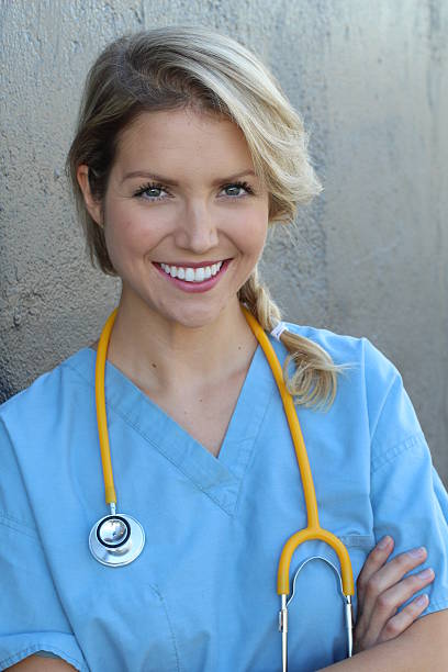 istock Beautiful smiling young female doctor 635821218