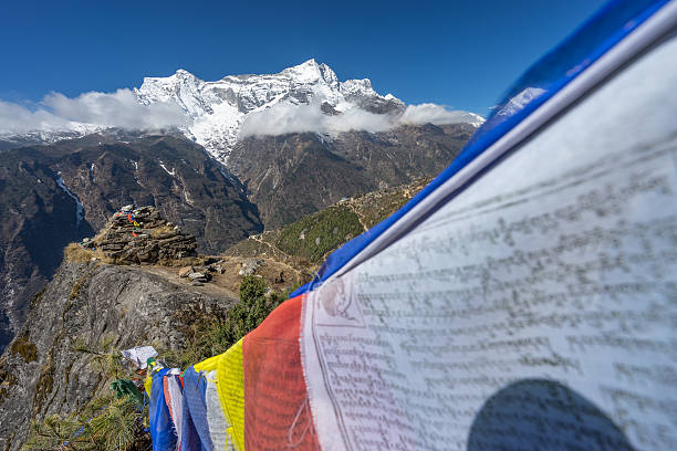 istock Kangde mountain peak with prayer flag, Everest region 635822012