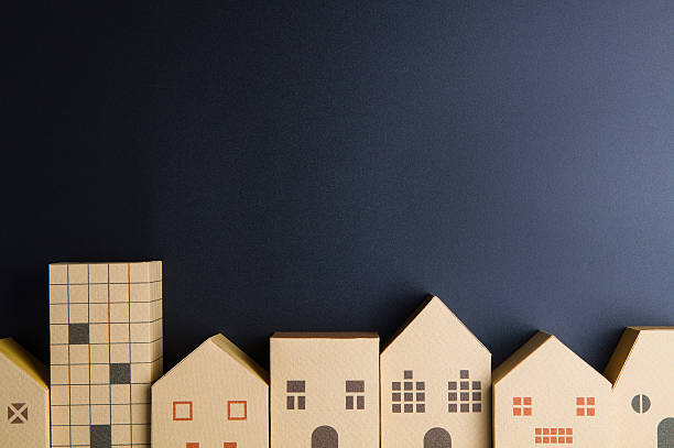 istock Home architectural model paper box cubes on black background 635822248