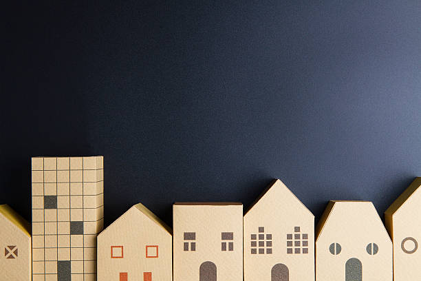 Home architectural model paper box cubes on black background