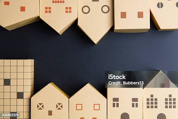 Home Architectural Model Paper Box Cubes On Black Background Stock Photo - Download Image Now