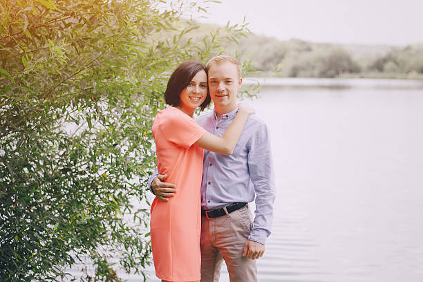 istock loving couple walking park 635824788