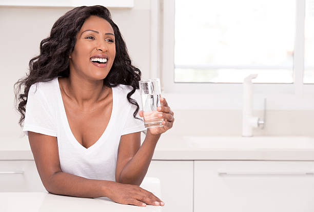 istock Woman healthy drinking. 635828356
