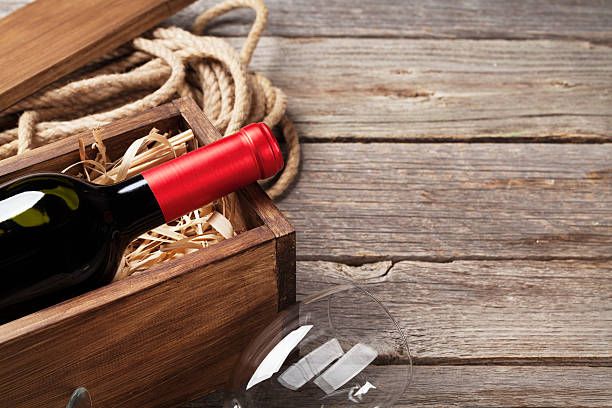 istock Red wine bottle and glass 635828752