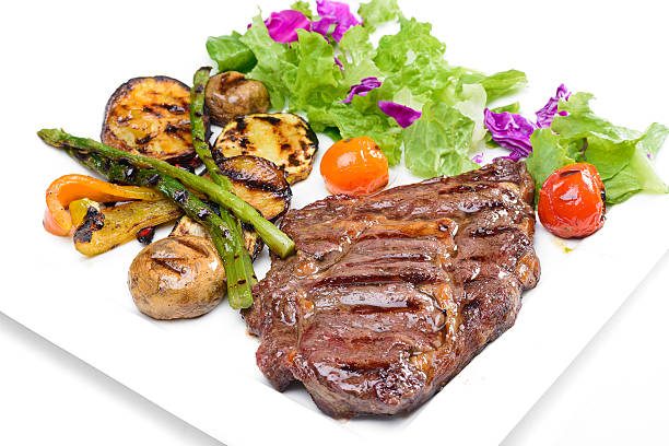 istock Beef steak with potatoes and Greens 635828872