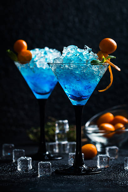 istock Blue cocktail in martini glasses 635831374