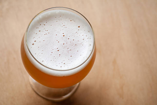 istock Wheat beer on wood 635832588