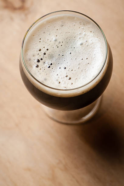 istock Imperial stout on wood 635837378