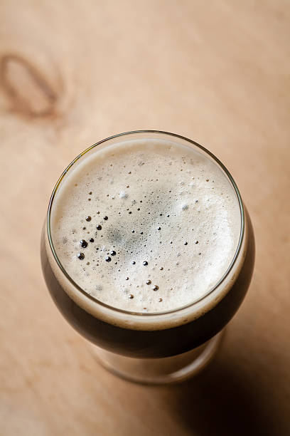 istock Imperial stout on wood 635837430