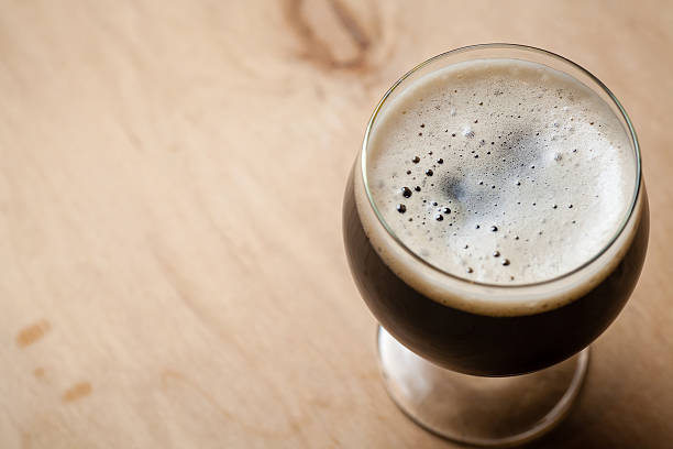 istock Imperial stout on wood 635837472