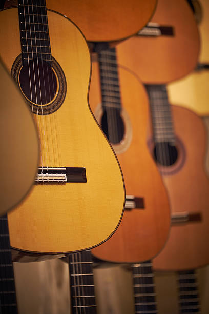 istock Classic guitars on display, background with depth of field 635839810