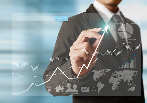 istock businessman hand writing  business graph 635844548