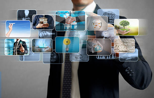 istock businessmen and Reaching images streaming 635845884