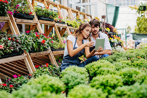 istock Young gardeners with digital tablet 635846968