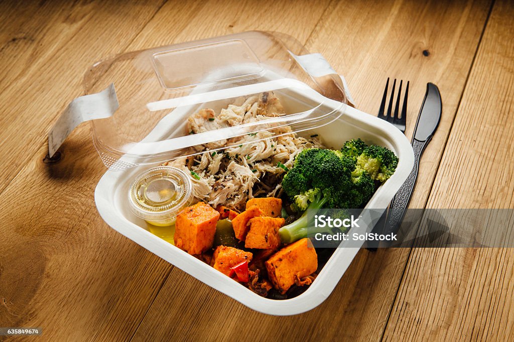 Ready-To-Eat Healthy Chicken Dinner Ready-To-Eat chicken dinner meal with brocolli, sweet potato, peppers and an oil drizzle. Food State Stock Photo